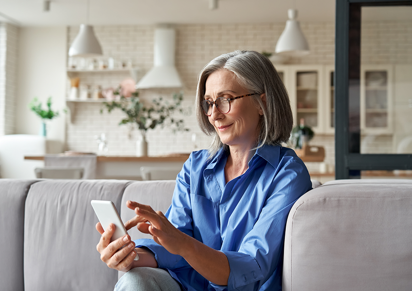 Senior woman looking at her smartphone