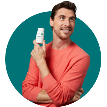 man holding prescription bottle from telehealth visit