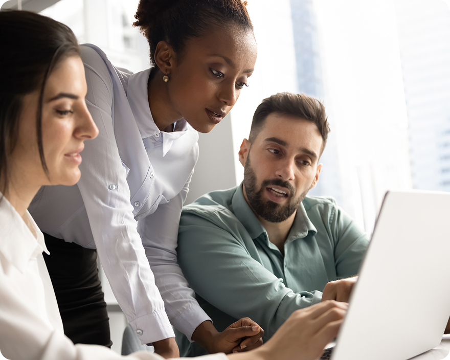 Clinicians reviewing results together on a laptop