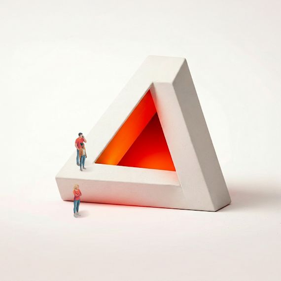 Miniature people standing on and inspecting a solid, impossible concrete Penrose triangle with a hollow orange emissive center.