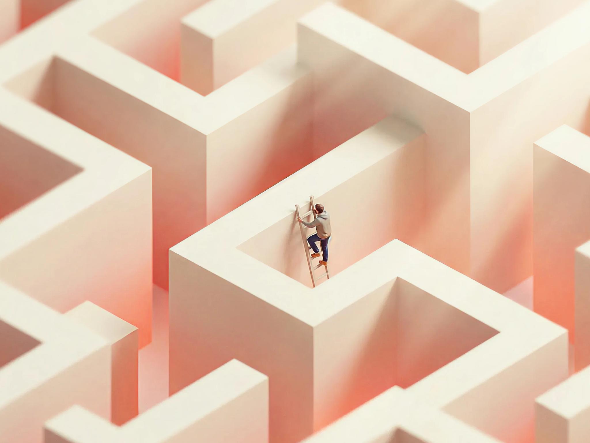 A miniature figure climbing a ladder within an intricate, high-walled concrete maze.