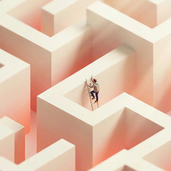 A miniature figure climbing a ladder within an intricate, high-walled concrete maze.