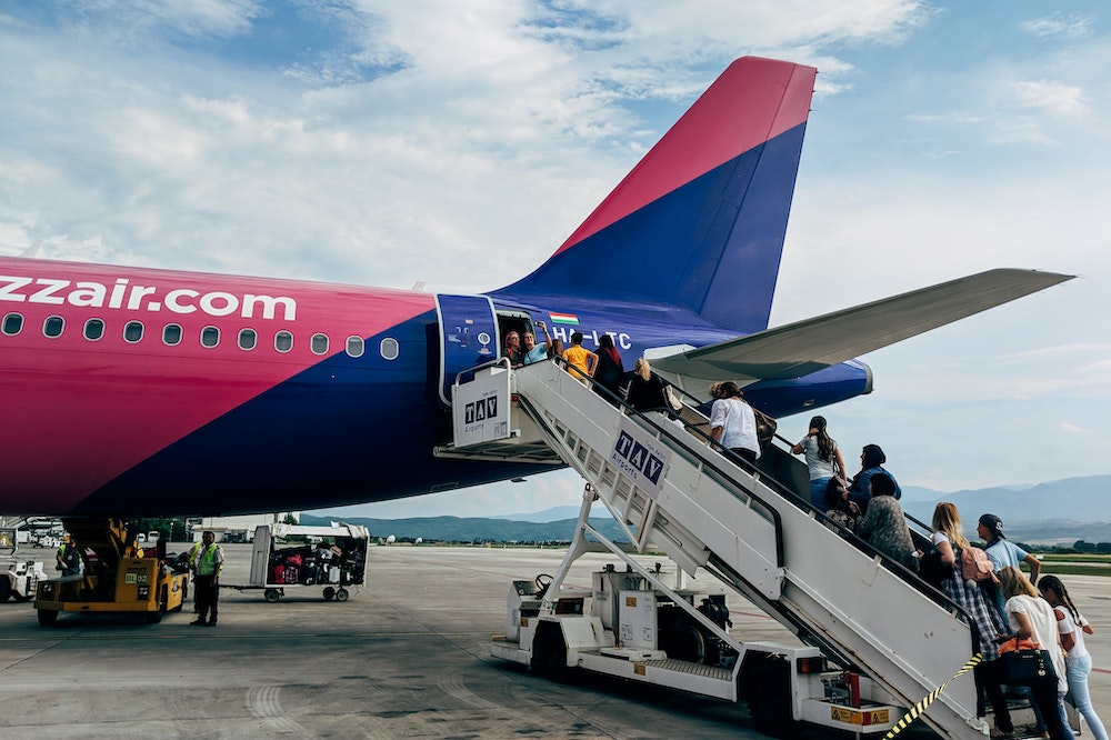 People boarding Wizz Air flight