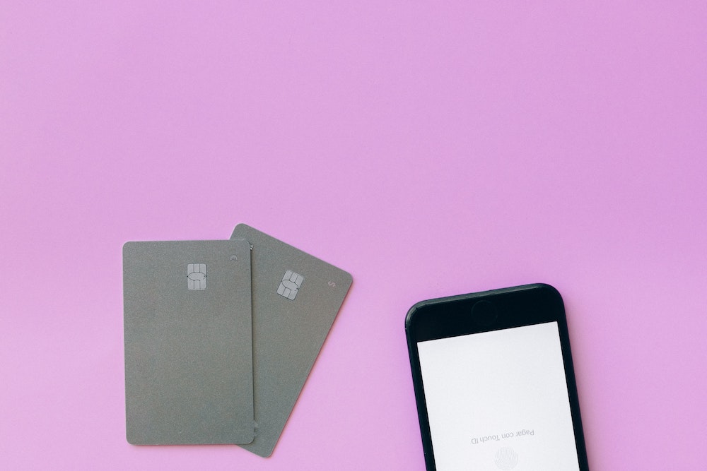 Credit cards on a pink background