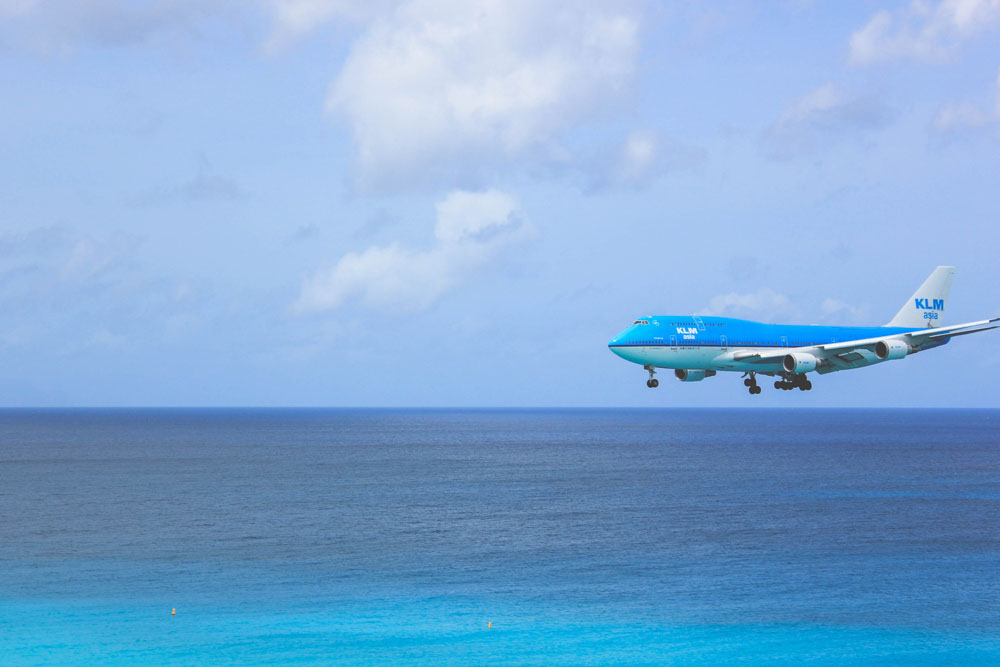 Plane flying over the sea