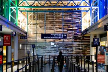 A woman walking in airport