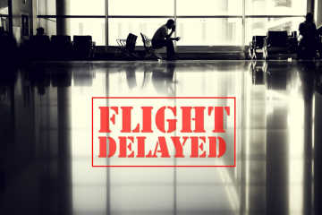 Flight is delayed sign