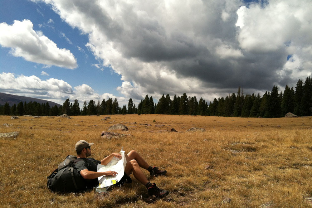 Traveler lying on the grass