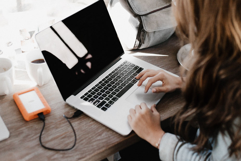 Traveller using a laptop