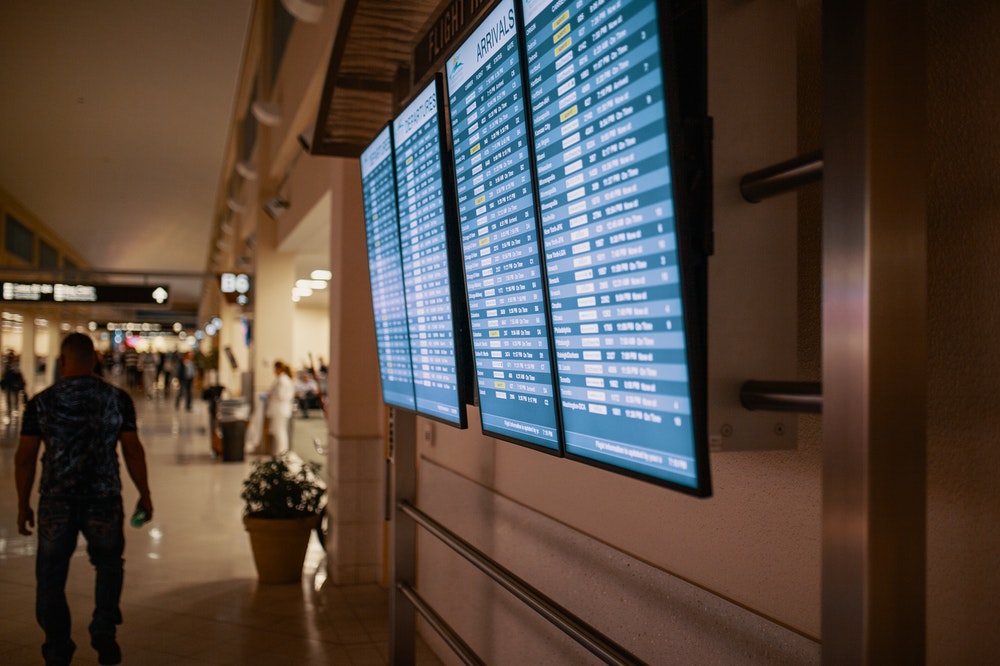 Flight information screens at the airport