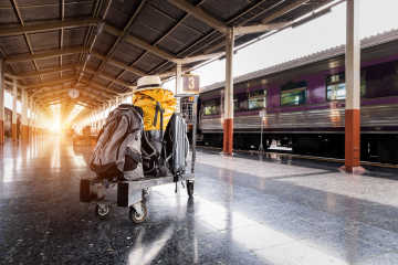 Luggage on a trolley in train station