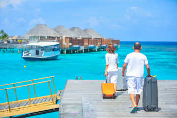 Two people on the pier - Traveller checklist for holiday