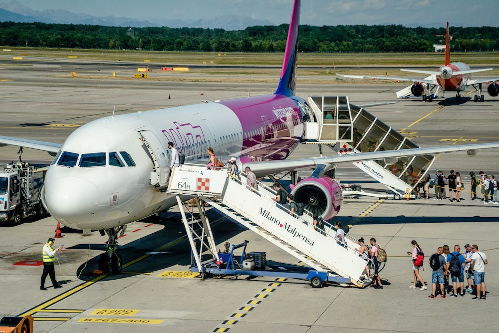 Passengers boarding a Wizz Air plane