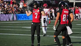 Ayden Eberhardt fights through for REDBLACKS TD