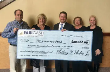 FABICash Donates $20,000 to The Tomorrow Fund