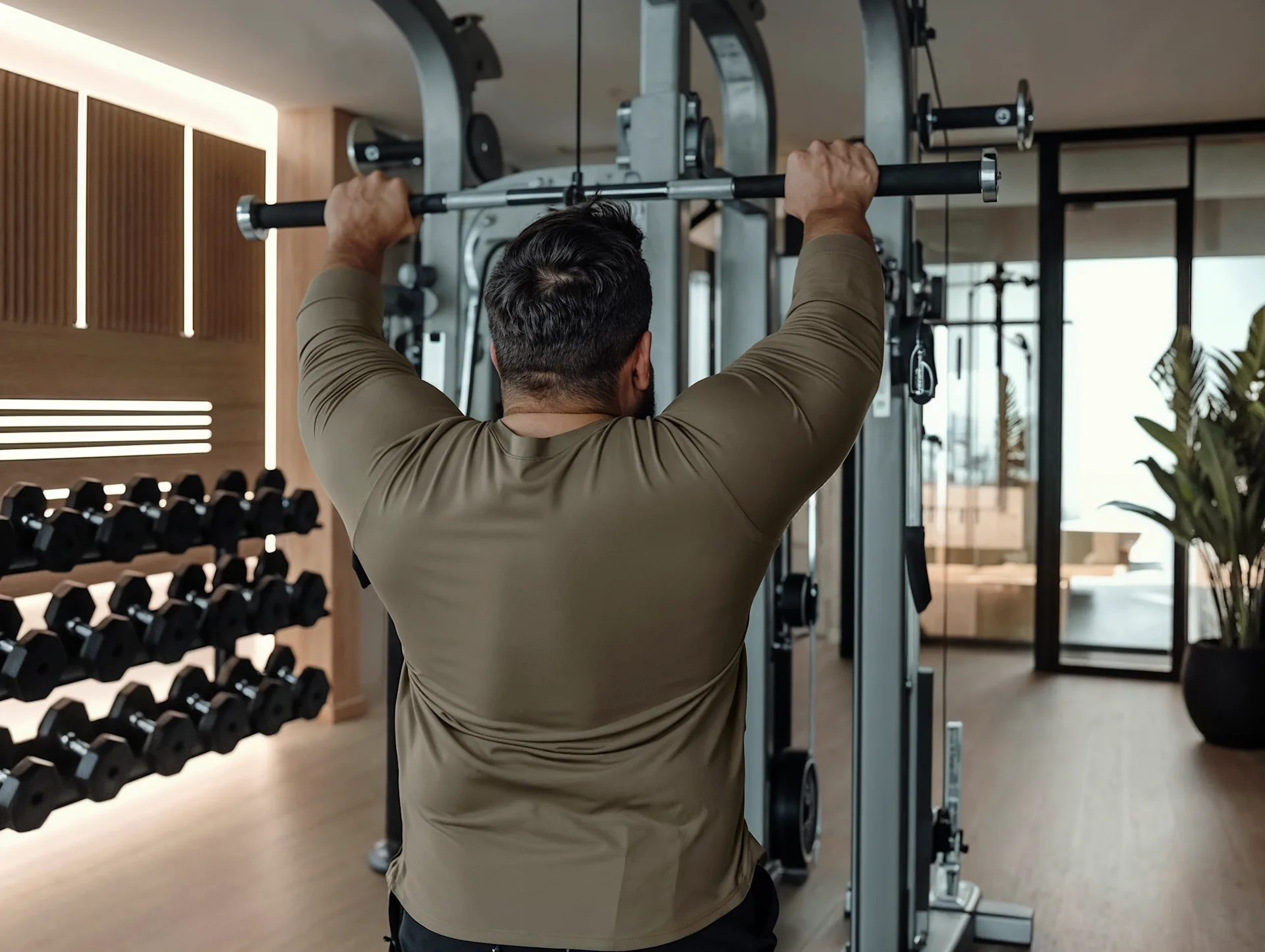 Man using a pulldown machine exercising