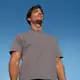 Guys with gray shirt standing
