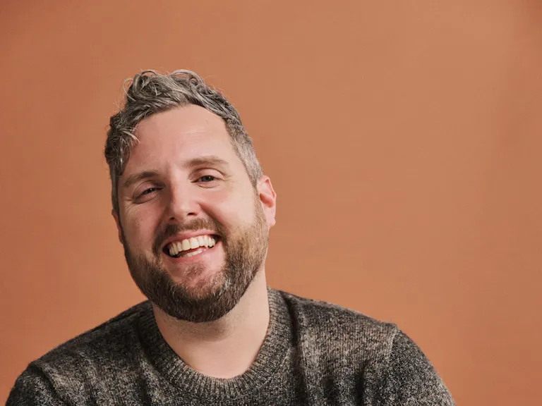 Man in studio smiling