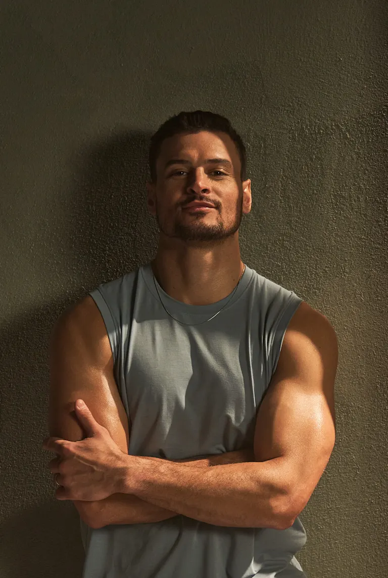 Man looks satisfied after a long gym session