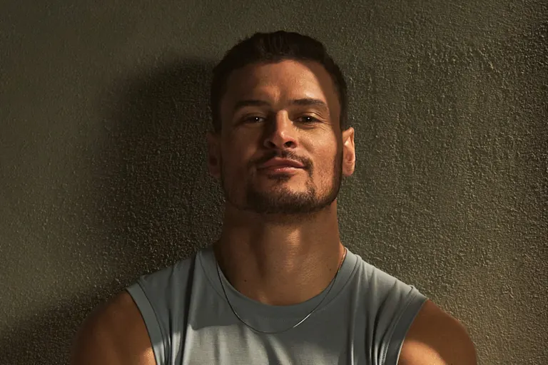 Man looks satisfied after a long gym session