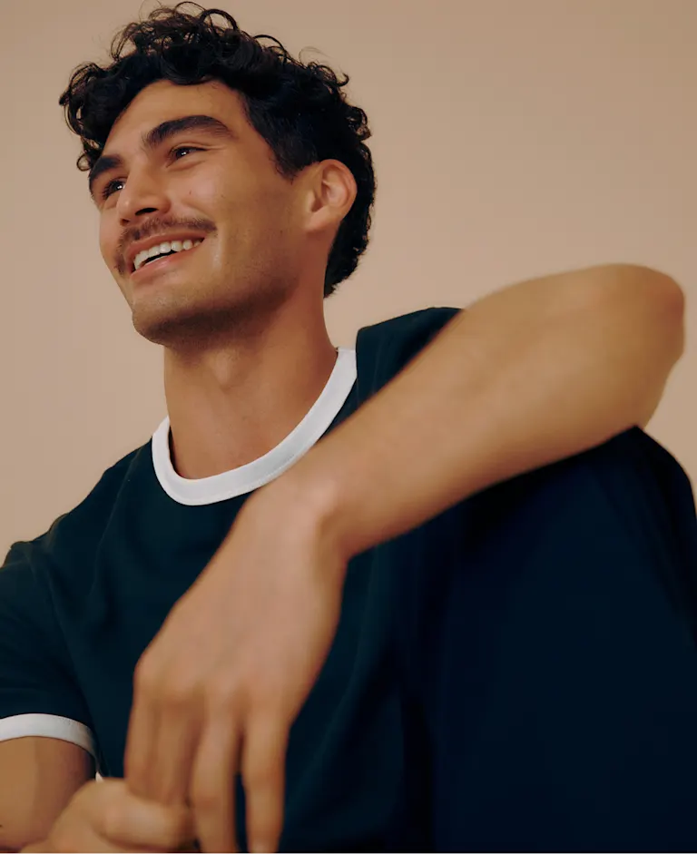 Man smiling casually