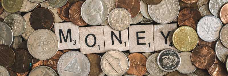 Money Scrabble letters with coins