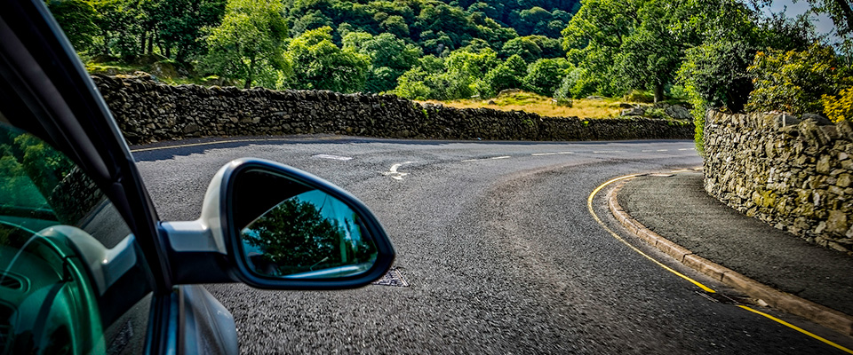 Car driving on a country road