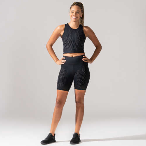 Full view of woman wearing OMORPHO G-Crop and weighted biker shorts