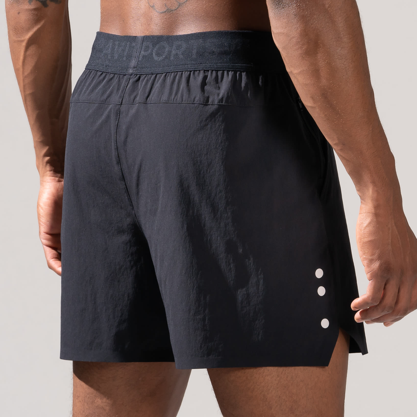 Side Back view of Male wearing OMORPHO Black O-Short gym shorts