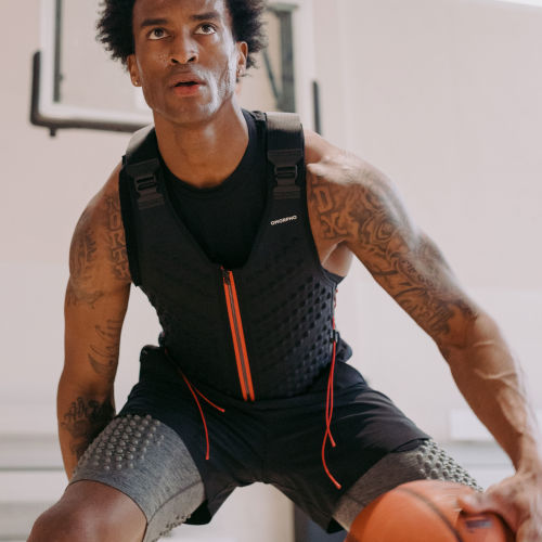 M Sport Bundle - Man dribbles basketball wearing G-Vest Sport, O-Shorts and G-Base weighted workout clothing