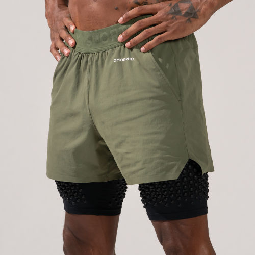 Close up of Male legs wearing OMORPHO Olive G-Short weighted shorts