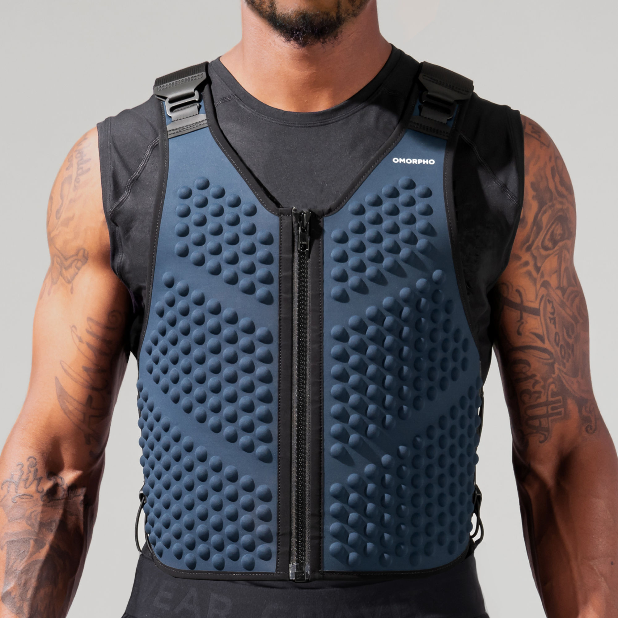 Front panel view of weighted dot pattern on OMORPHO G-Vest weight vest for men in ocean blue