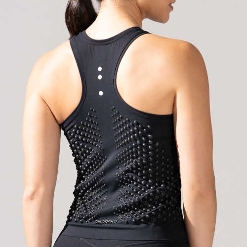 Back view of young woman wearing a Black weighted G-Tank top from OMORPHO