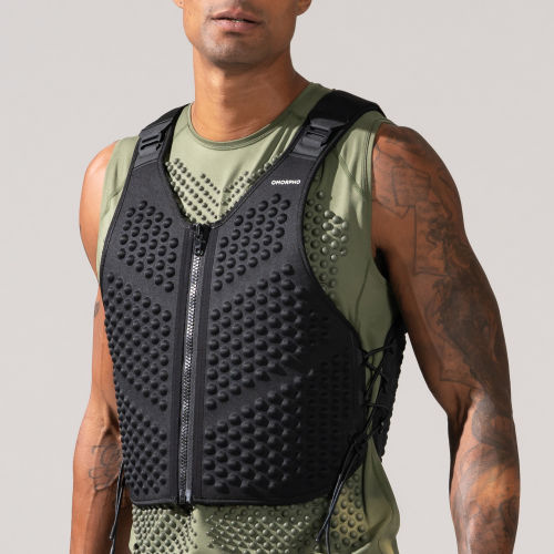 Male wearing OMORPHO Black G-Vest and Olive G-Tank weighted workout vest