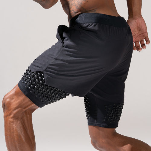 Left Side View of Male wearing OMORPHO Black G-Short training shorts