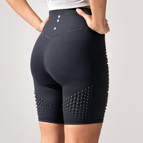 Back view of Female wearing OMORPHO Black G-Biker Short weighted athletic shorts