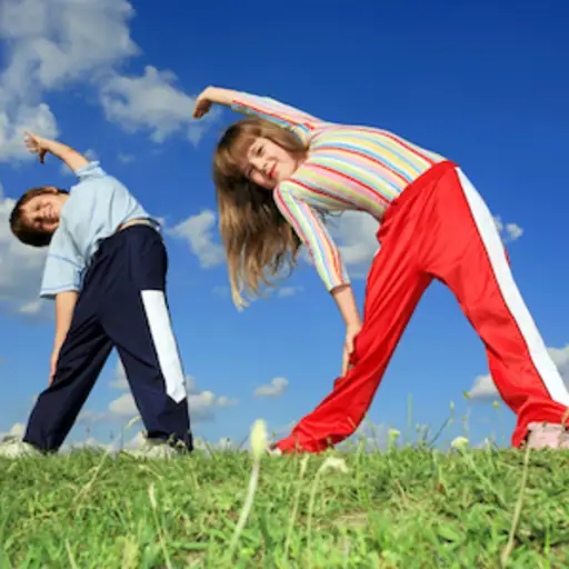 two young children exercising in field
