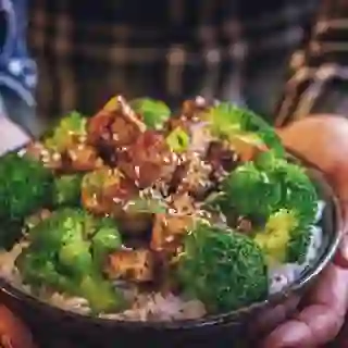 Roasted tofu and broccoli over rice.