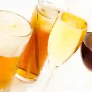 Various glasses of alcoholic beverages