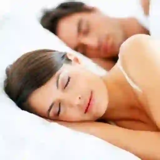 Young couple sleeping.