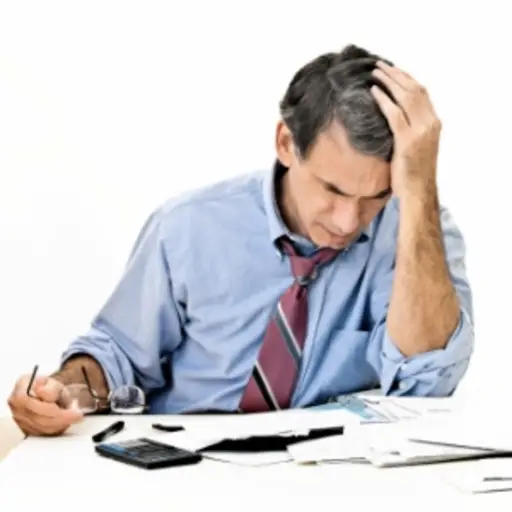 Stressed man working.