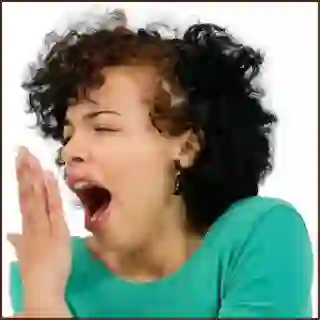 Woman yawning.