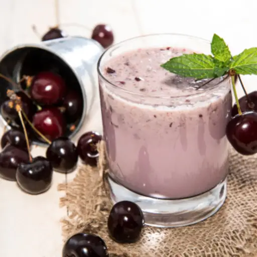 Black cherry smoothie and fresh cherries.