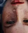 close up of woman's face with freckles