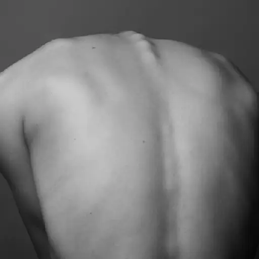 bare back hunched over