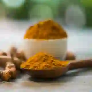 A view of a spoon of turmeric powder