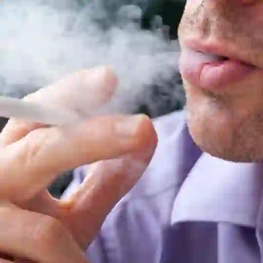 Man smoking a cigarette.