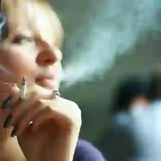 Woman smoking a cigarette.
