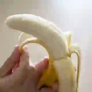 Peeling a banana.