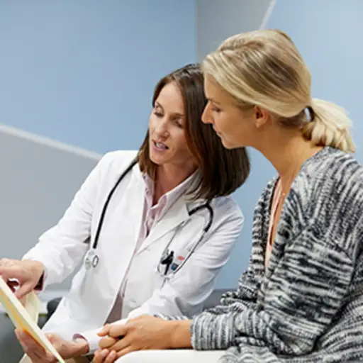 Doctor giving a patient medical advice.